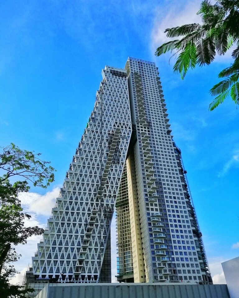 Residential tower against blue sky