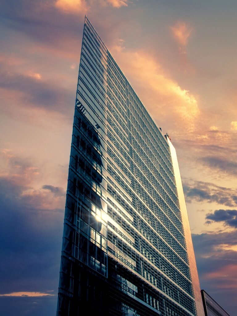 Glass building facade at dusk
