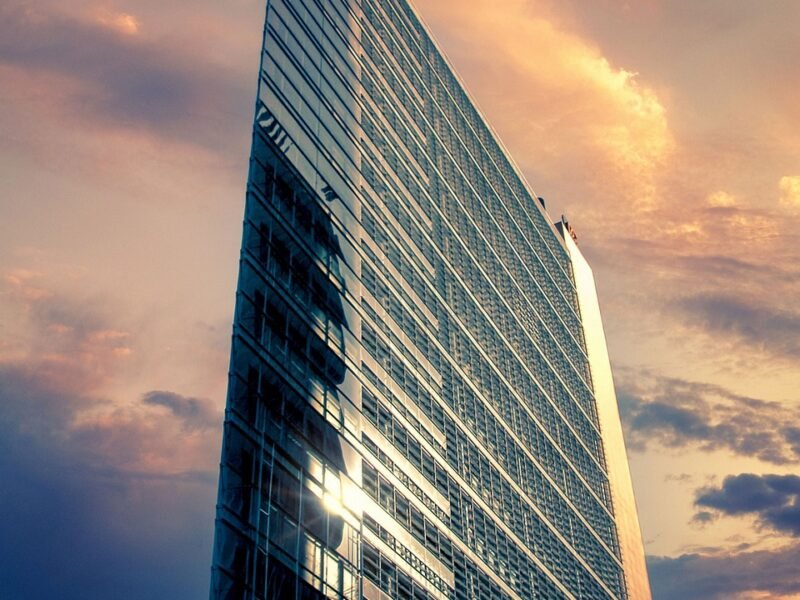 Glass building facade at dusk